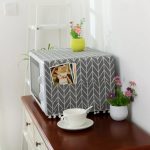 Protect Your Microwave: Dustproof Fabric Microwave Oven Cover with Bonus Storage Pockets